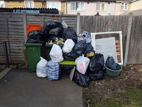 Professional team clearing a cluttered garage in Forest Hill